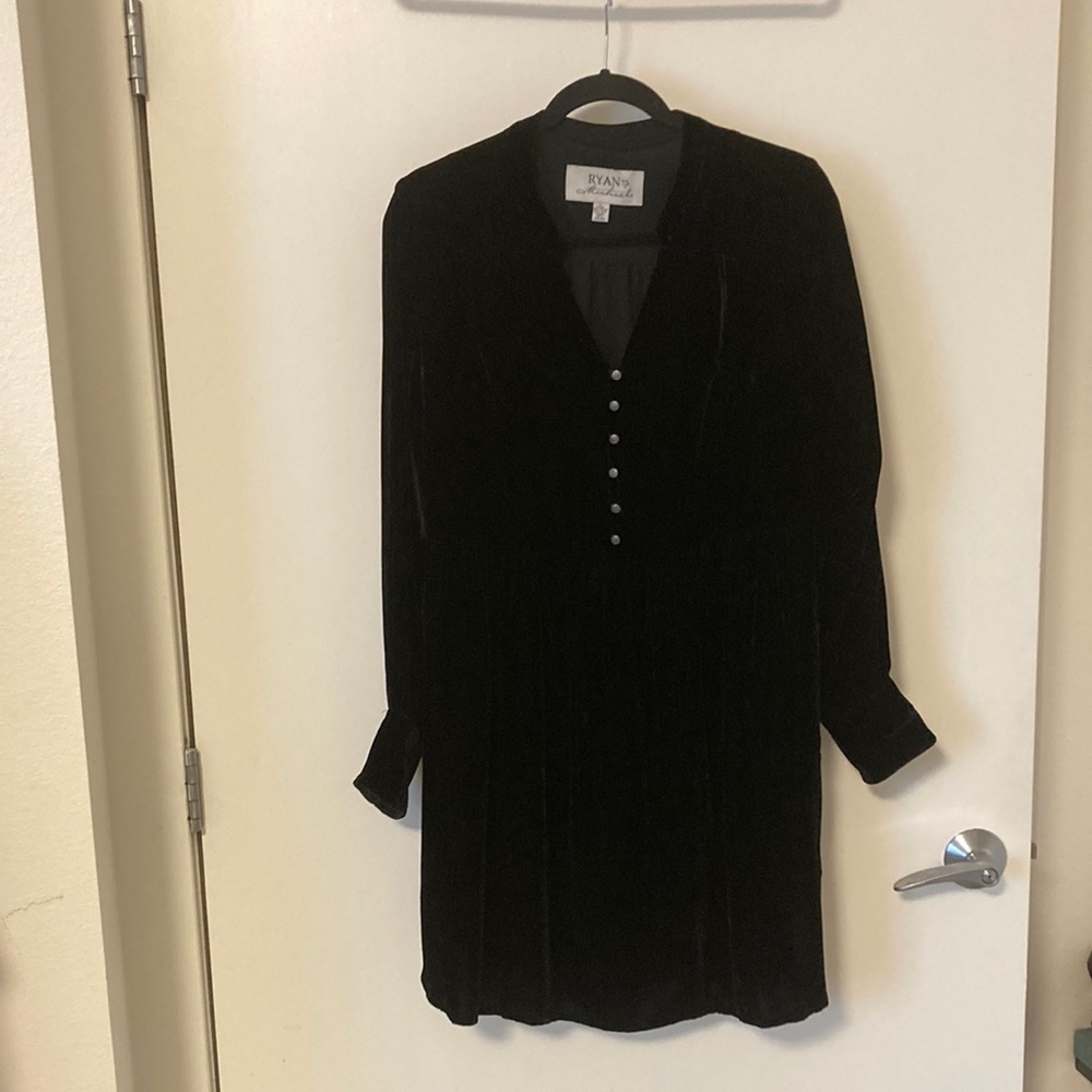 Black velvet mini dress with silver buttons.
